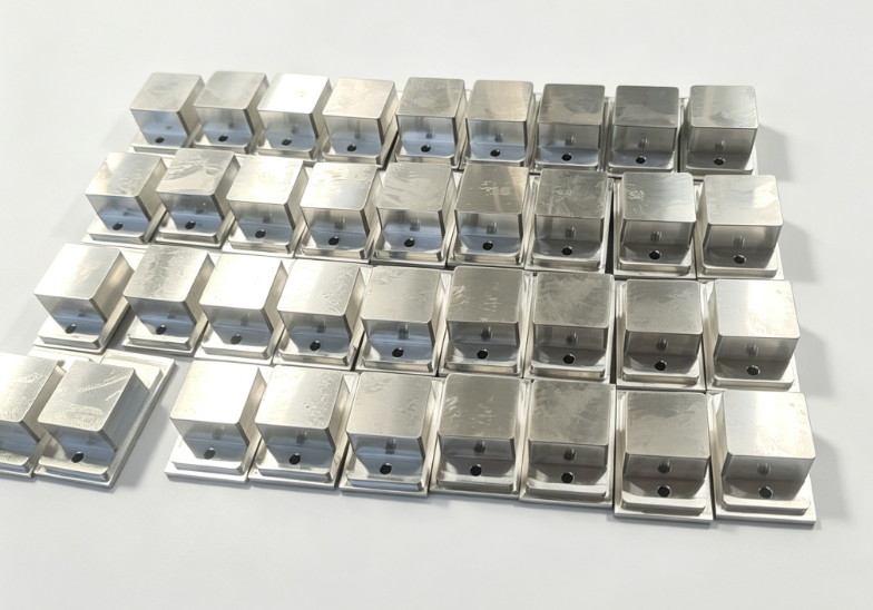 Modular metal base, automated welding process, and consistent dimensions across batches.